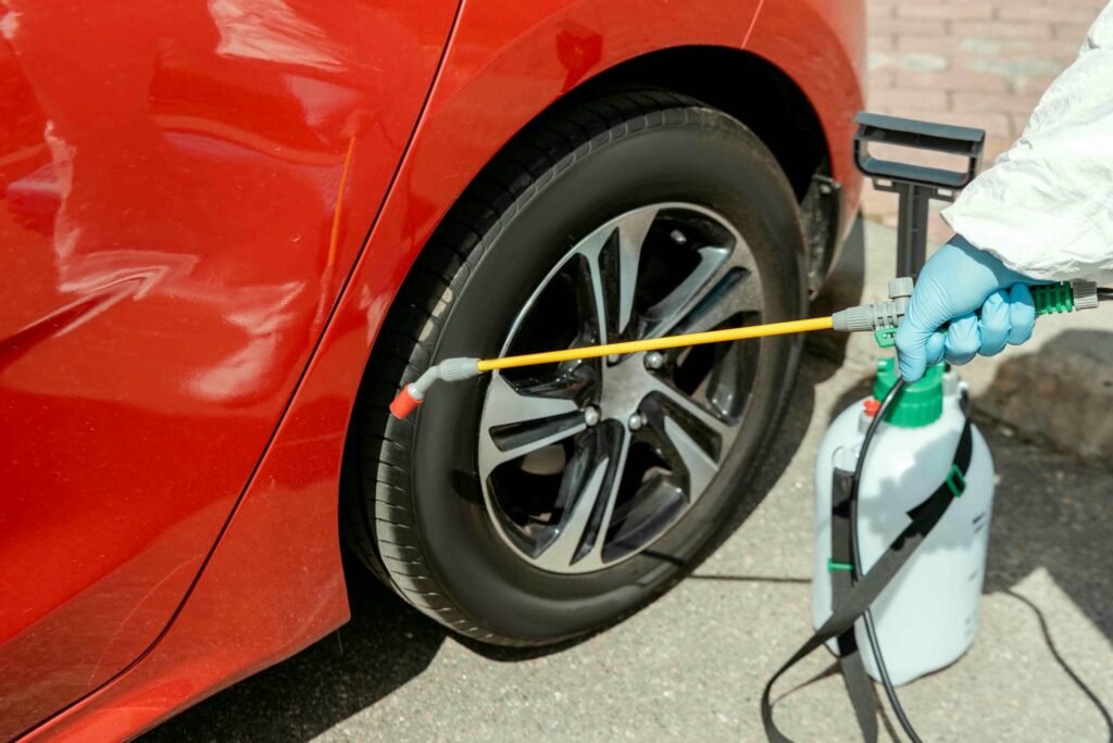 cropped-view-of-specialist-in-protective-suit-clea-2023-11-27-05-27-30-utc - Tyre Shop Singapore | Tire Pte Ltd Tire pressure | tyre shop singapore | tire pte ltd