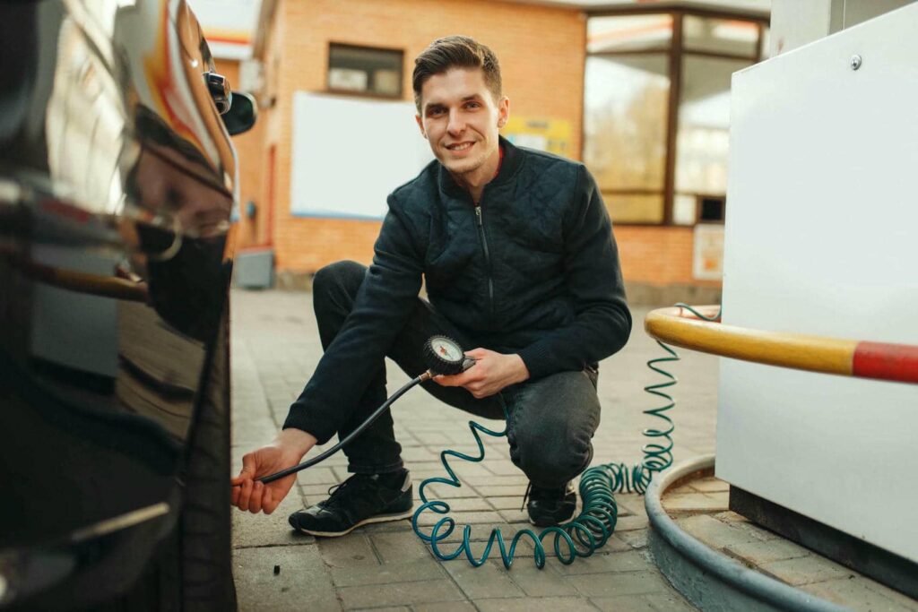 male-person-checks-the-tire-pressure-tyre-service-2023-11-27-05-28-01-utc - Tyre Shop Singapore | Tire Pte Ltd Tire pressure | tyre shop singapore | tire pte ltd